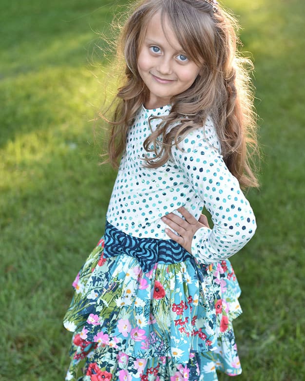 Phoebe's Drop Waist Dress | The Simple Life Pattern Company PDF sewing pattern girls tween knit woven combo dress ruffle neck ruffle sleeves bow belt sash single double tier skirt back to school dress fall winter spring summer sewing dress pattern downloadable shirt dress