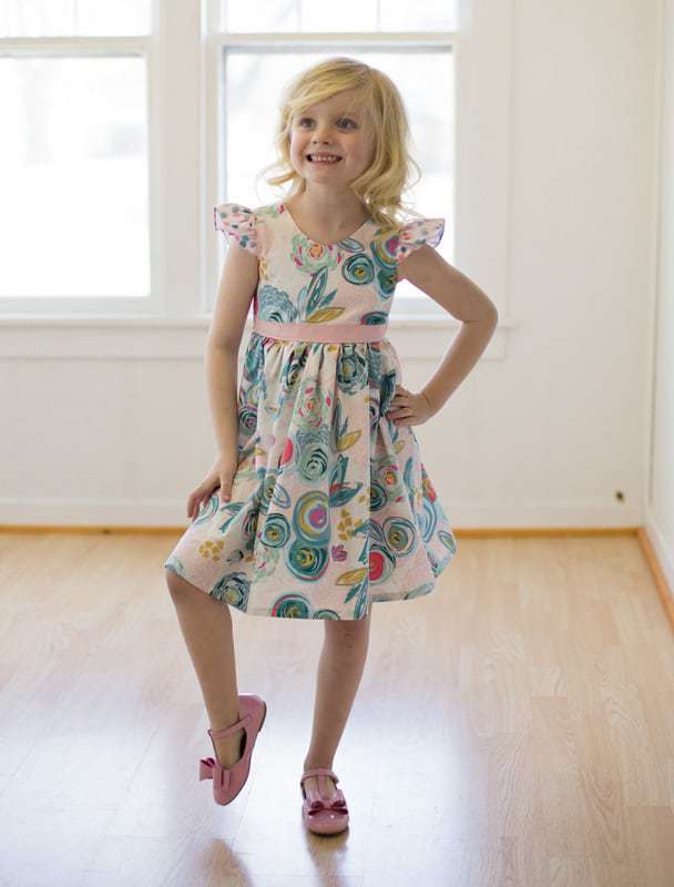 Sophie Dress | The Simple Life Pattern Company fast easy beginner PDF sewing pattern downloadable top dress long sleeves cap sleeves ruffle dress top scoop back v back ruffle neck faux sash button back open back spring summer fall winter back to school dress holiday fancy special occasion party dress