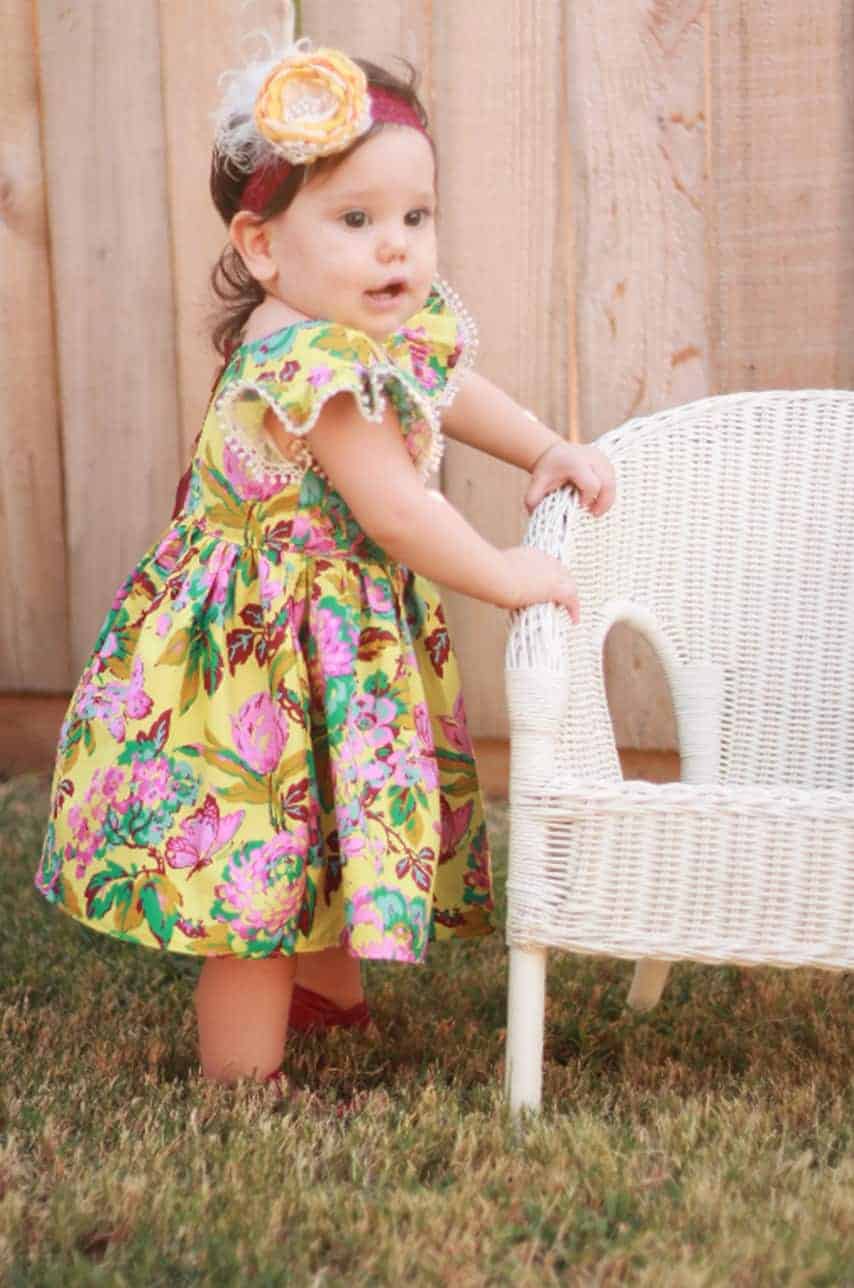 Baby Helena's Button Back Top and Dress Tester Round Up. PDF Sewing Patterns Baby Sizes NB-24 Months. Top, Dress, Spring, Summer, Fall, Winter, Pintuck Placket, Button Back, Sleeveless, Sleeves, Baby, Newborn, Flutters, High-Low