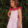 Sandy's ruffle neck tiered top and dress is just darling for all ages. Featuring a ruffle elastic neckline, it is a great summer dress pattern. Choose top or dress length. This pattern also has optional side ties to cinch in the waist and add a beautiful feminine touch. There are no closures on this dress so it is perfect for dressing up or everyday play. Want the ultimate twirl factor? Choose the tiered skirt option. This pattern is great for showcasing all your favorite prints in one dress. the simple life pattern company. pdf downloadable beginner sewing patterns. dress top skirt knit woven summer spring fall winter sleeves modern toddler girl kids fashion trendy vintage fast easy pattern strappy back open back flounce b