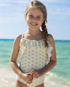 Simple Life Pattern Company | Marian's Criss-Cross Tankini & One-Piece Downloadable PDF Sewing Pattern for Girl's and Toddler Sizes 2T-12 Marina features the on-trend criss-cross strap in the back.  It can be sewn as a one piece or a tankini.  Both versions can feature the optional top ruffle or it can be made as a simple swimsuit without the ruffle.  The tankini also has an optional skirt ruffle for the ultimate girly swimsuit.  A shorten/lengthen line is included for the perfect fit and coverage you may want.