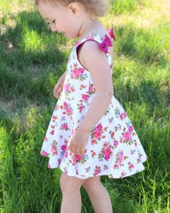 Simple Life Pattern Company | Baby Skyler's Square Back Top & Dress Downloadable PDF Sewing Pattern for baby sizes newborn to 24 months Baby Skyler's Square Back Top & dress is loaded with is many options.   Baby Skyler features three different back options, making this pattern the perfect staple for every season.  Open square back with side bows or a large center bow, square cutout back with side bows or a simple square back.  A modest line is available for those that love the look of the back but need a little more coverage.  Choose from sleeve tabs, short sleeves, elbow sleeves, long sleeves or sleeveless.  The higher bodice is perfect for adding embellishments or monograms.  You have the choice between a circle skirt or gathered skirt.  Peplum, tunic or dress length.  