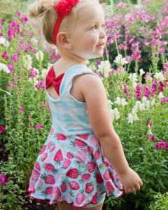 Simple Life Pattern Company | Skyler's Square Back Top & Dress Downloadable PDF Sewing pattern for toddler and girl sizes 2t-12 Skyler's Square Back Top & dress is loaded with is many options.   Skyler features three different back options, making this pattern the perfect staple for every season.  Open square back with side bows or a large center bow, square cutout back with side bows or a simple square back.  A modest line is available for those that love the look of the back but need a little more coverage.  Choose from sleeve tabs, short sleeves, elbow sleeves, long sleeves or sleeveless.  The higher bodice is perfect for adding embellishments or monograms.  You have the choice between a circle skirt or gathered skirt.  Peplum, tunic or dress length.  The top length pairs beautifully with the Tammy Tulip shorts.