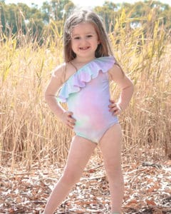 Simple Life Pattern Company | Elise's One Shoulder Swimsuit & Tankini. Downloadable PDF Sewing Patterns for Toddler and Girl Sizes 2T-12. Elise's One Shoulder swimsuit can be sewn as a one piece or a tankini.  Both versions can feature the optional flounce and skinny strap or be left as a simple single shoulder suit.  The tankini also has an optional circle skirt for the ultimate girly swimsuit.  Fully lined or partial lining.  A shorten/lengthen line is included for the perfect fit and coverage you may want.