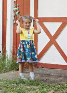 Simple Life Pattern Company | Harriet's Handkerchief Tunic & Skirt Downloadable PDF Sewing Patterns for Toddle and Girl Sizes 2T-12. Harriet has two length options, including a tunic and dress, which hits 1" above the knee.  There are several sleeve options-sleeveless, short sleeve, elbow sleeve, and long sleeve.  The sleeves have a cute elastic casing detail.  This is an easy fitting pattern with no closures and waist elastic.  Harriet has three skirt options.  Dress is made as a double handkerchief skirt.  The tunic can be made as a single or double handkerchief skirt.  There is also a simple gathered skirt for both the tunic or dress length.  The back is adorned with a beautiful keyhole and small strap detail.