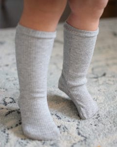 Simple Life Pattern Company | Baby Sloane's Knee High Socks. Downloadable PDF Sewing Pattern for Baby Sizes Newborn to 24 Months. Sloane's Knee High Socks will keep your littles warm all winter long.  Choose from ankle, crew or knew high length.  Sloane is a fun way to use up all of those knit fabric scraps you have lying around.  Perfect for the whole family.