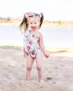 Baby Lorelei's Flutter Cutout Swimsuit. Downloadable PDF Sewing Pattern for Baby Sizes Newborn to 24 Months Baby Lorelei is a beautiful swimsuit with so many fun options! Baby Lorelei features a one shoulder look. It can be made very simple or you can have some fun and add the vertical flutter or the pretty little cutout.  This swimsuit is perfect for all those hot summer days playing in the pool, on the beach or at the lake.