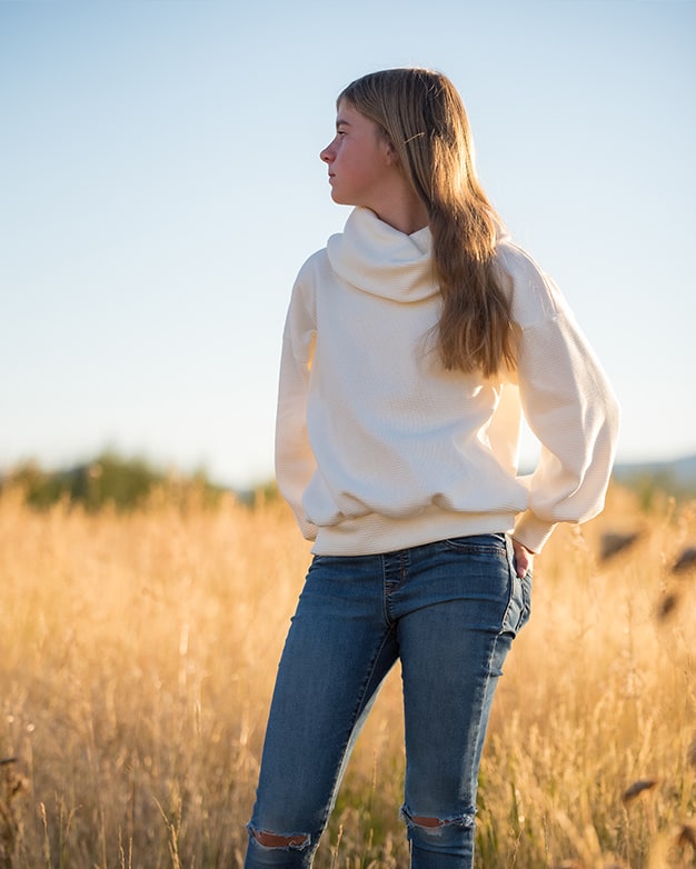 Crystal Crop Top Tunic turtleneck sweater. Simple Life Pattern company. Fast easy downloadable pdf sewing patterns with A0 and projector friendly files. Print at home tutorial with pattern pieces on the fold and unfolded. Cozy sweater knit oversized girls kids sweater with bell sleeves and cuffs. Dolman shirt with band. Long sleeves.